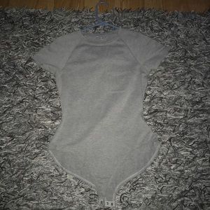 Grey body suit